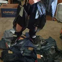 destroying a stack of jeans